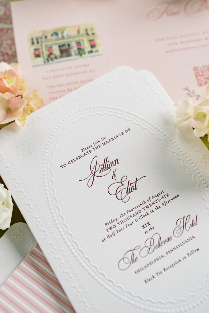 Close up of Letterpress printing and Embossed Details on a Wedding Invitations